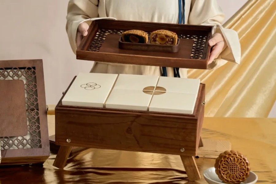 Handcrafted wooden melody harmonizing with fragrant tea on a full moon night