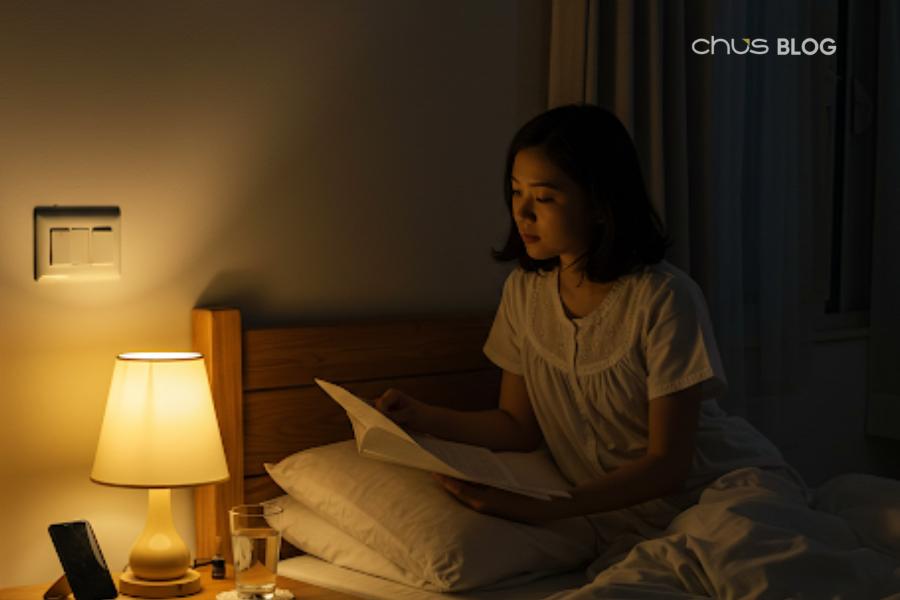 The ritual of turning off ceiling lights and only using small bedside lamps 30 minutes before going to bed - a signal for your brain to rest