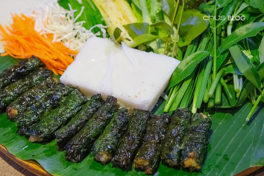 Evenly skewered beef wrapped in wild betel leaves, grilled to appealing golden color