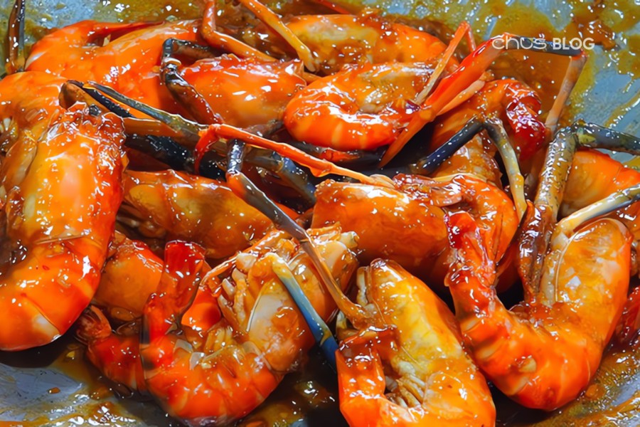 Glossy red tamarind shrimp like ruby gems