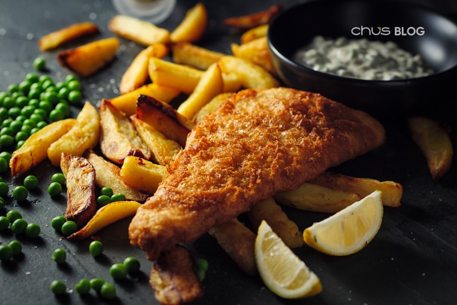 Golden crispy British-style fish and chips with french fries