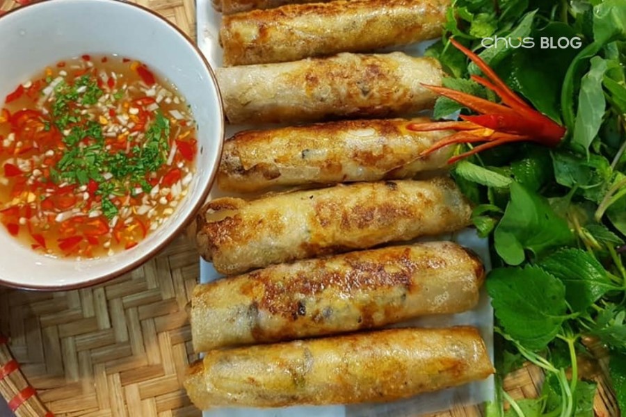 Small golden crispy spring rolls with fragrant meat and wood ear filling