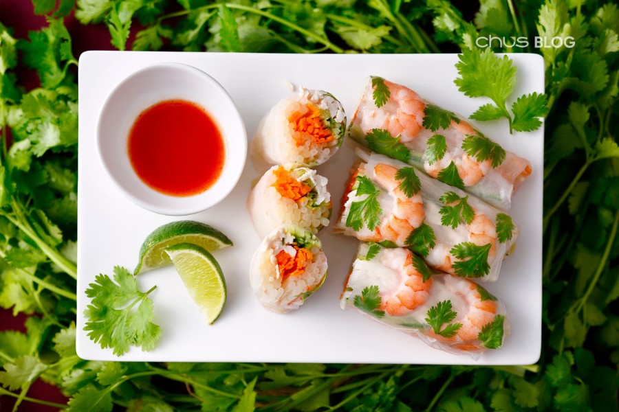 Fresh transparent spring rolls like pearls on a plate