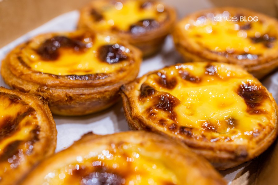 Cute small egg tarts decorated with fresh greenery