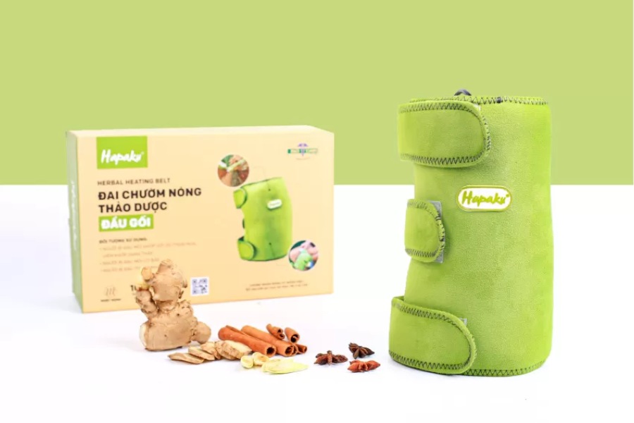 Traditional herbal compress bag with natural color scheme, ergonomically designed