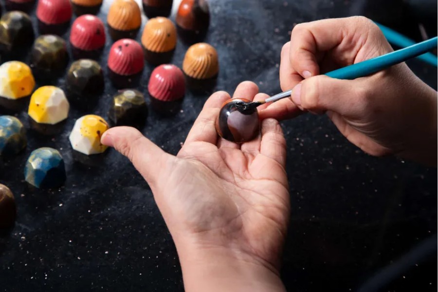 Premium chocolate box with artistically shaped chocolate pieces
