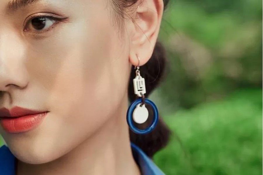 The sparkling beauty of silver earrings with artistic design