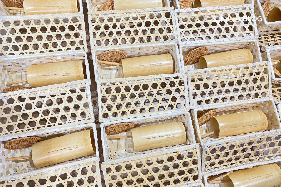 The message "Schneider Electric Manufacturing Vietnam With Compliments" elegantly engraved on bamboo cups