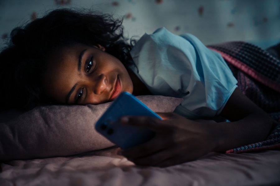 Bad habits like scrolling through your phone before bed negatively impact your sleep