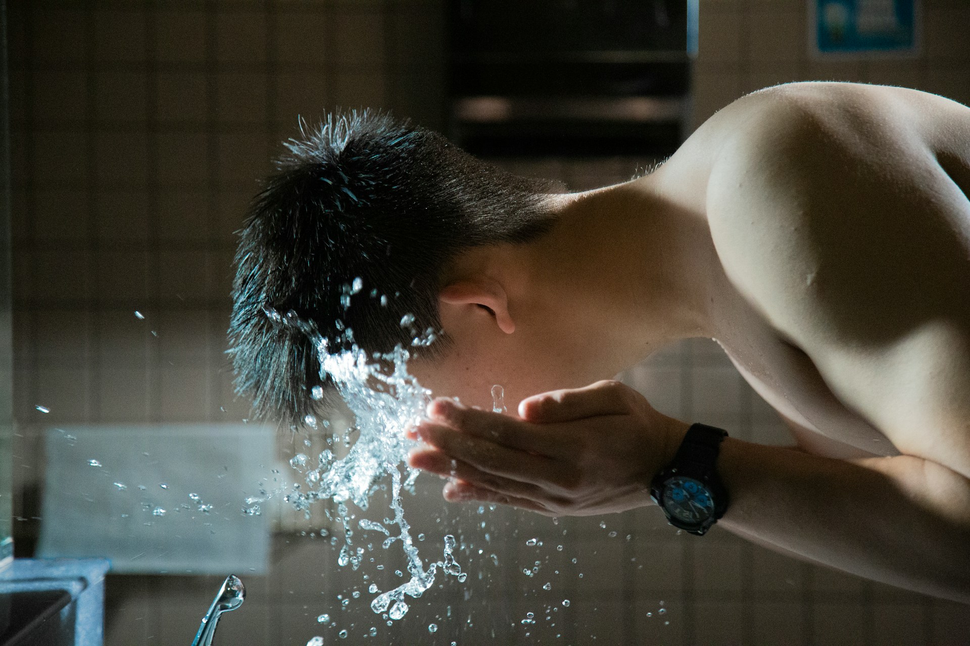 washing face with water